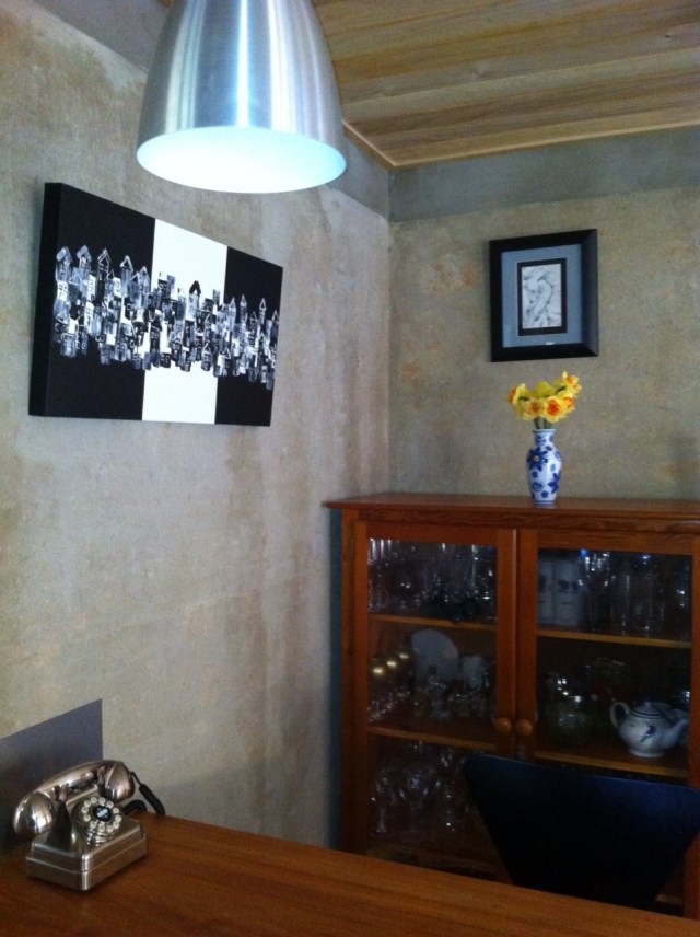 The texture and look of each wall is a little different - but they all share solidity and a sense of permanence, not to mention making a great backdrop for some of our art.